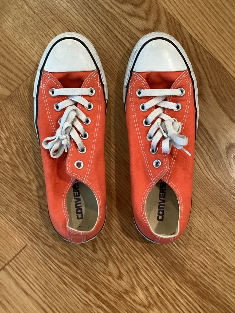 Converse Women’s Low Top Sneakers in Orange and White